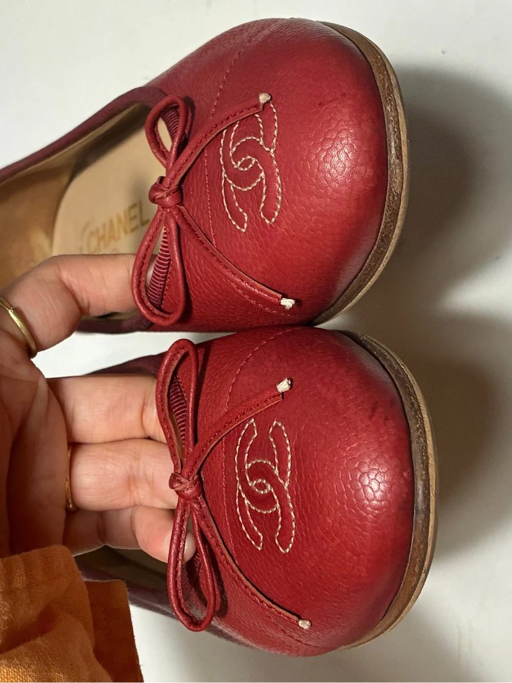 CHANEL Red caviar Leather Ballet Flats with Bow Detail
